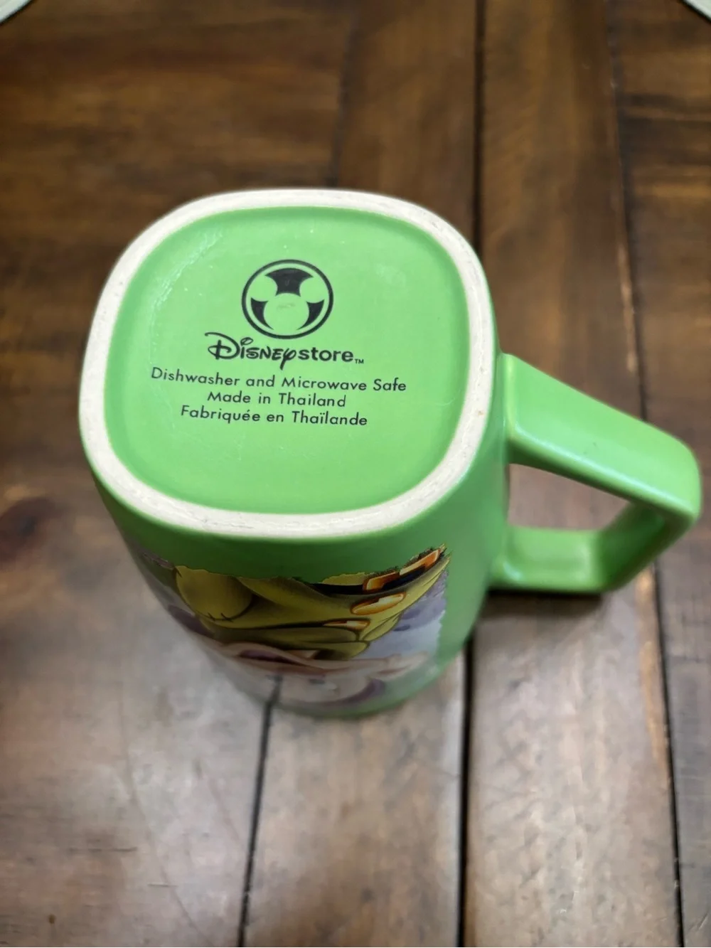 Large green ceramic Disney store dopey Snow White mug holds 18 ounces